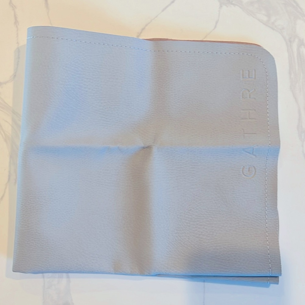 Gathre micro size mat in light grey for diaper changing.Used handful of times.